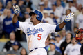 13MLBプレーオフ、ナ・リーグ地区シリーズ（5回戦制）、ロサンゼルス・ドジャース（Los Angeles Dodgers）対アトランタ・ブレーブス（Atlanta Braves）第4戦。8回裏に2点本塁を放つロサンゼルス・ロジャースのホアン・ウリーベ（Juan Uribe、2013年10月7日撮影）。(c)AFP/Getty Images/Harry How