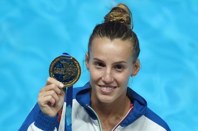 カニョットが中国の牙城崩し女子1m板飛び込みで金、第16回世界水泳