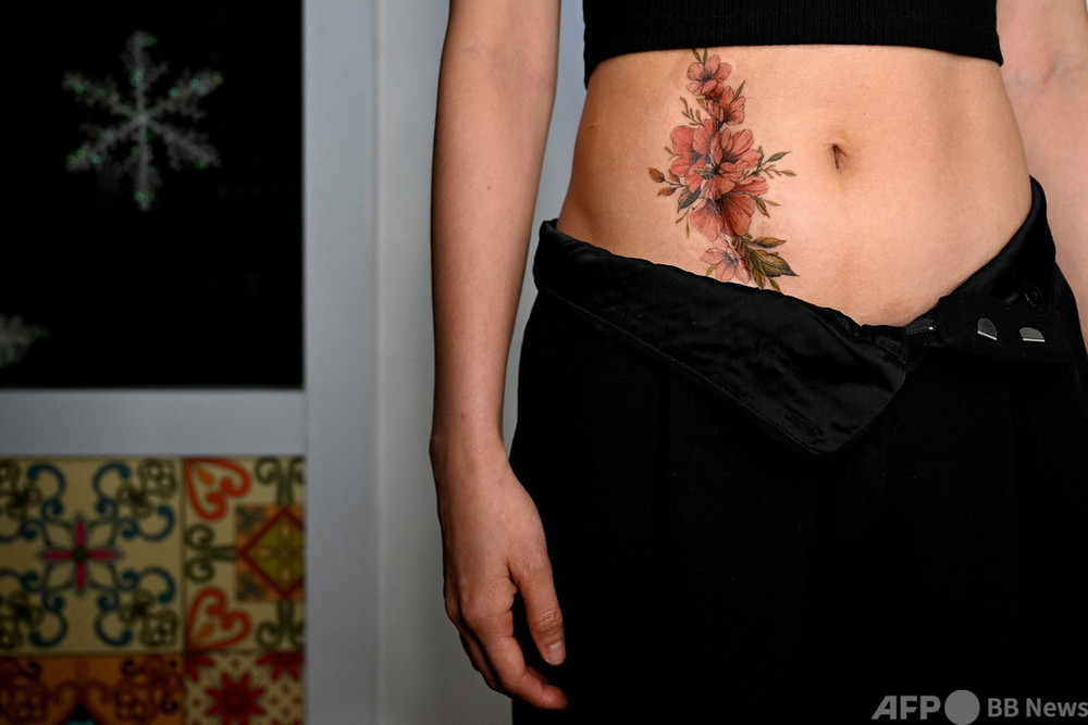 傷痕に咲いた花 女性たちを癒やすタトゥー ベトナム 写真18枚 国際ニュース Afpbb News 傷痕に咲いた花 女性たちを癒やすタトゥー ベトナム 写真18枚 国際ニュース Afpbb News