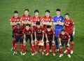 13クラブW杯（2013 FIFA Club World Cup）準決勝、広州恒大（Guangzhou Evergrande FC、中国）対バイエルン・ミュンヘン（Bayern Munich）。試合前の写真撮影に臨む広州恒大の選手（2013年12月17日撮影）。(c)AFP/ERIC FEFERBERG