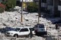 メキシコ・ハリスコ州グアダラハラ東部で、ひょうが積もった道路（2019年6月30日撮影）。(c)Ulises RUIZ / AFP