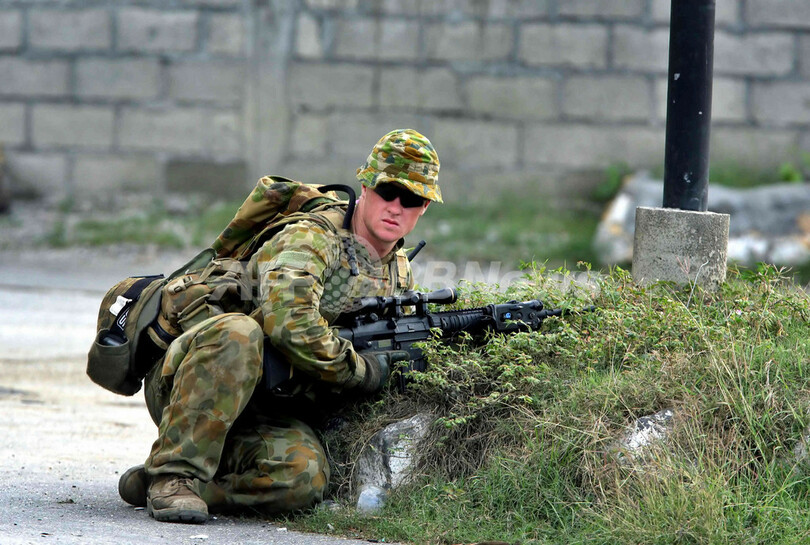 豪軍首都入りで緊張した静けさ - 東ティモール
