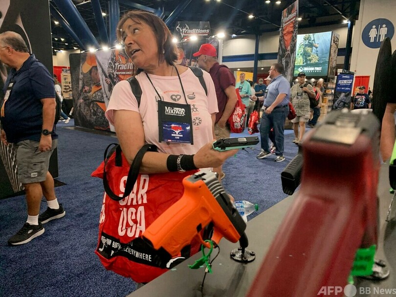 「銃は悪くない」 全米ライフル協会総会に集う人々、小学校乱射への反応