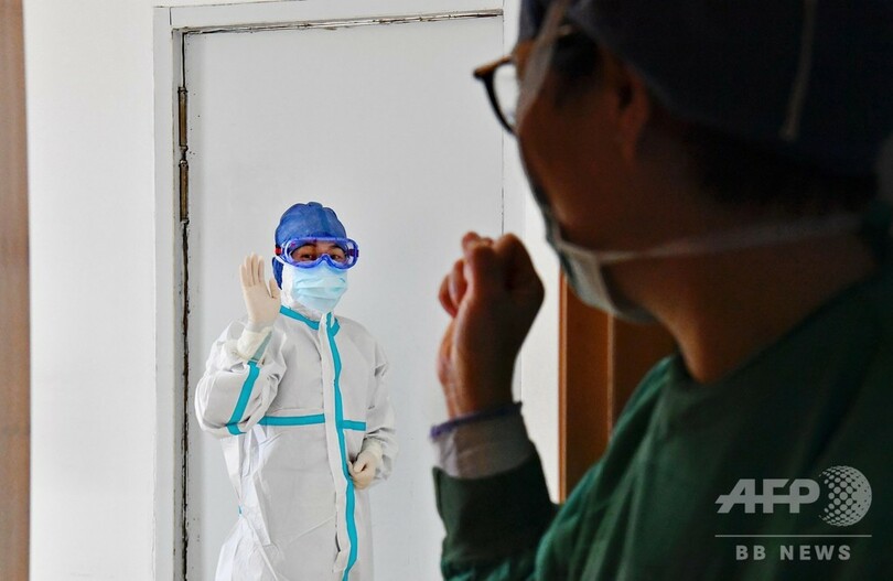 最前線でウイルスと闘い続ける、中国の医療関係者ら