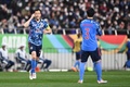 2022年サッカーW杯カタール大会アジア最終予選グループB、日本対ベトナム。ゴールを喜ぶ吉田麻也（左、2022年3月29日撮影）。(c)Charly TRIBALLEAU / AFP