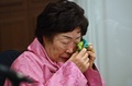 韓国ソウルで記者会見する旧日本軍の元従軍慰安婦、李容洙（イ・ヨンス）さん（2021年2月16日撮影）。(c)Jung Yeon-je / AFP