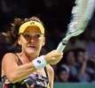 女子テニス、WTAツアー選手権（BNP Paribas WTA Championships - Singapore 2014）4日目。リターンを狙うアニエスカ・ラドワンスカ（Agnieszka Radwanska、2014年10月23日撮影）。(c)AFP/ROSLAN RAHMAN