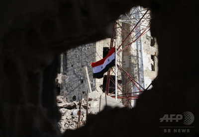 シリア政府軍、内戦発端の地に国旗掲揚 南部ダルアー市