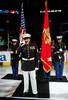 国歌独唱を行う米国海兵隊ファン・コントレラス二等軍曹。(c)AFP/Getty Images Jim McIsaac