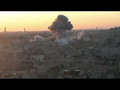 シリア中部ホムス（Homs）に立ち上る煙。動画サイト「ユーチューブ（YouTube）」より（2012年6月7日撮影）。(c)AFP/ HO / YOUTUBE