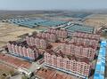 空から見た官営子村（ドローンから、2025年4月15日撮影）。(c)Xinhua News