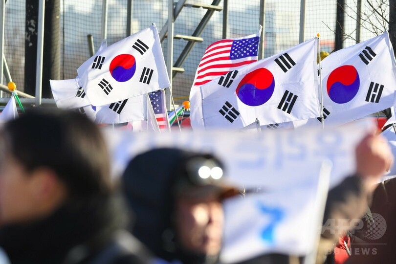 南北合同ホッケーチームが初練習試合、「平壌五輪」と抗議デモも