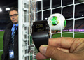 報道陣向けに発表された「ゴールライン・テクノロジー（GLT）」、「ゴールレフ（GoalRef）」。ボールがゴールラインを越えると、腕時計が振動し、「ゴール」と表示される仕組みになっている（2012年12月5日撮影）。(c)AFP/Yoshikazu TSUNO