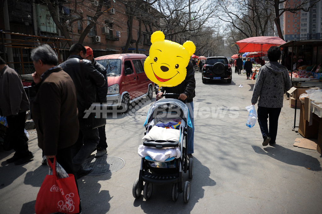 路上に叩き付けられた2歳児が重体、駐車めぐる腹いせで 中国 写真1枚 国際ニュース:AFPBB News
