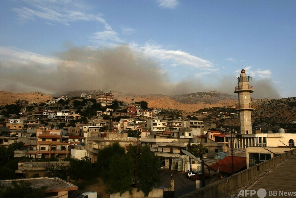 ヒズボラ、イスラエルを攻撃 大量の砲弾・誘導ミサイルで 写真1枚 国際ニュース:AFPBB News