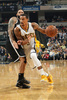 14-15NBA、インディアナ・ペイサーズ対ブルックリン・ネッツ。ドライブを仕掛けるインディアナ・ペイサーズのラボイ・アレン（2015年3月21日撮影）。(c)AFP/Getty Images/NBAE/Ron Hoskins