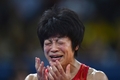 ロンドン五輪は8日、エクセル（ExCeL London）でレスリング・フリースタイル女子48キロ級決勝が行われ、小原日登美（Hitomi Obara）はアゼルバイジャンのマリア・スタドニク（Mariya Stadnyk）を下し、金メダルを獲得した。

試合終了後に喜びの涙を流す小原日登美（2012年8月8日撮影）。(c)AFP/YURI CORTEZ