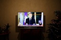 エマニュエル・マクロン大統領のテレビ演説。フランス北西部Bretteville-sur-Odonで（2018年12月10日撮影）。(c)CHARLY TRIBALLEAU / AFP
