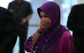 マレーシアの首都クアラルンプールの郊外プトラジャヤで、消息を絶ったマレーシア航空MH370便の調査報告書の発表会場を訪れた遺族の女性（2018年7月30日撮影）。(c)AFP PHOTO / Mohd RASFAN
