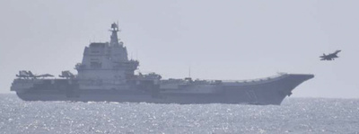 Japan says scrambled jets because of China aircraft carrier