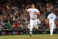 MLBオールスターゲーム2018。9回に同点に持ち込む2点本塁打を放ち喜ぶナ・リーグのスクーター・ジェネット（2018年7月17日撮影）。(c)Patrick Smith/Getty Images/AFP