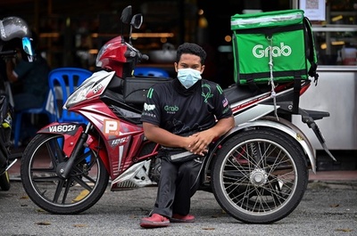 障害あるデリバリーマン疾走 マレーシア