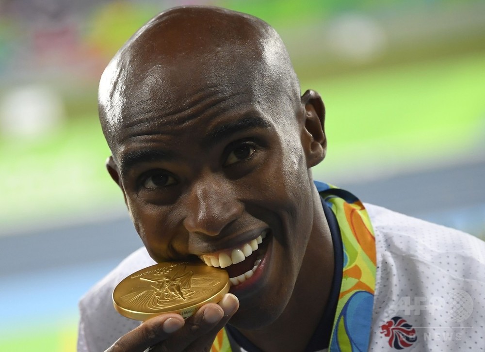 国際ニュース：AFPBB Newsファラーが男子1万m連覇、転倒しながらも金メダル獲得