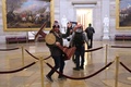 米首都ワシントンにある連邦議会議事堂に侵入したデモ隊（2021年1月6日撮影）。(c)Win McNamee/Getty Images/AFP