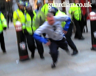 G20デモで突然死の男性、死因は腹部出血 暴行の警官を聴取