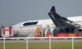 タイ・バンコク（スワンナプーム）国際空港（Suvarnabhumi International Airport）で、着陸時に滑走路をそれたタイ航空（Thai Airways）機。タイ航空のロゴや名称を表示した部分は隠されている（2013年9月9日撮影）。(c)AFP/KITTIWONGSAKUL