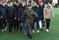 韓国・論山の訓練所で行われた入隊式典で新兵を先導する韓国兵（2019年1月14日撮影）。(c)Jung Yeon-je / AFP