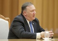 北朝鮮・平壌で金正恩（キム・ジョンウン）朝鮮労働党委員長と会談するマイク・ポンペオ米国務長官。朝鮮中央通信提供（2018年5月9日撮影、10日公開）。(c)AFP PHOTO/KCNA VIA KNS