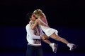 ソチ冬季五輪、フィギュアスケート・エキシビションの演技に臨むタチアナ・ボロソジャー（Tatiana Volosozhar）/マキシム・トランコフ（Maxim Trankov）組（2014年2月22日撮影）。(c)AFP/JOHN MACDOUGALL
