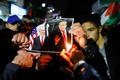パレスチナ自治区ガザ地区で、ドナルド・トランプ米大統領による中東和平案発表を控え、抗議デモを行う人（2020年1月28日撮影）。(c)MOHAMMED ABED / AFP