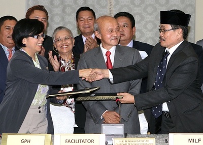 比政府とモロ・イスラム解放戦線、武装解除で合意