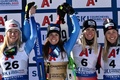 アルペンスキー世界選手権、女子スーパー大回転。表彰式でポーズをとる（左から）2位に入った米国のミカエラ・シフリン、優勝したイタリアのマルタ・バッシーノ、3位に入ったオーストリアのコーネリア・ヒュッターとノルウェーのカイサビッコフ・リー（2023年2月8日撮影）。(c)Jeff PACHOUD / AFP