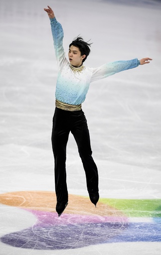 羽生が世界最高得点でSP首位発進、フィギュア四大陸選手権 写真13枚 