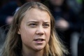 スウェーデンの首都ストックホルムで、気候変動対策を求める運動「フライデーズ・フォー・フューチャー（未来のための金曜日）」のデモに参加する同国の環境活動家グレタ・トゥンベリさん（2022年9月9日撮影）。(c)Jonathan NACKSTRAND / AFP
