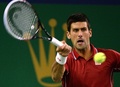 男子テニス、上海マスターズ（2014 Shanghai Rolex Masters）シングルス準決勝。リターンを狙うノバク・ジョコビッチ（Novak Djokovic、2014年10月11日撮影）。(c)AFP/GOH CHAI HIN