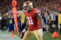 19NFL、NFC決勝、サンフランシスコ・フォーティナイナーズ対グリーンベイ・パッカーズ。タッチダウンを決め喜ぶサンフランシスコ・フォーティナイナーズのラヒーム・モスタート（2020年1月19日撮影）。(c)Sean M. Haffey/Getty Images/AFP