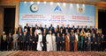 エジプト・カイロ（Cairo ）で、イスラム協力機構（OIC）首脳会議の開幕にあたり集合写真撮影に臨む参加各国の首脳ら（2013年2月6日撮影）。(c)AFP/HO/EGYPTIAN PRESIDENCY