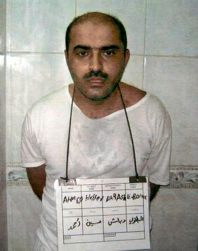 テロ容疑者を拘束、数百人の殺害を認める - イラク