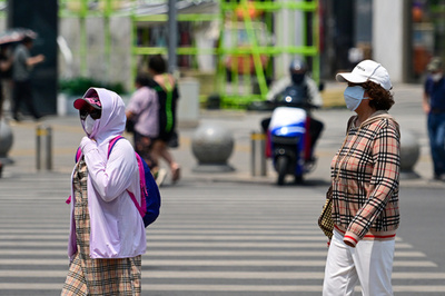 日焼け対策は「塗る」から「隠す」へ 中国で売れる「奇妙」な衣料品
