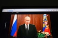 ロシア・モスクワで演説するウラジーミル・プーチン大統領の映像（2023年6月24日撮影）。(c)Natalia KOLESNIKOVA / AFP