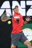 全豪オープンテニス、男子シングルス4回戦。フォアハンドを打つ錦織圭（2017年1月22日撮影）。(c)AFP/SAEED KHAN