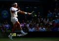 テニス、ウィンブルドン選手権（The Championships Wimbledon 2014）男子シングルス4回戦。リターンを打つラファエル・ナダル（Rafael Nadal、2014年7月1日撮影）。(c)AFP/CARL COURT