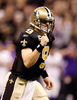 09NFLプレーオフ、ナショナル・カンファレンス（NFC）決勝、ニューオーリンズ・セインツ（%%New Orleans Saints%%）対ミネソタ・バイキングス（%%Minnesota Vikings%%）。試合はセインツが31-28で勝利し、チーム創設以来初のスーパーボウル進出を決めた。写真は第2クォーターに9ヤードのタッチダウンパスを成功させて歓喜するセインツのドリュー・ブリーズ（%%Drew Brees%%）。（2010年1月24日撮影）(c)AFP/Getty Images/Chris Graythen