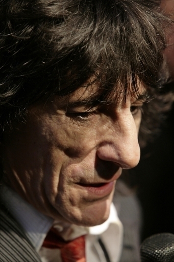 ストーンズのギタリストR・ウッド逮捕、恋人への暴行容疑