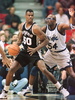 San Antonio Spurs center (50) David Robinson drives past Orlando Magic forward (54) Horace Grant during the first period of the game at the Orlando Arena 4 February.  Magic won 122-109 in overtime. (c)AFP/Tony RANZE