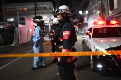 Elderly Japanese hostage taker 'had grudge' with post office